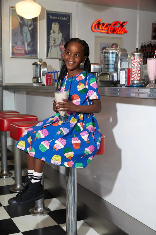 Image of a model wearing Dress. Productname: Cup Cakes Kids Dress in Navy colour by brand - Dangerkids