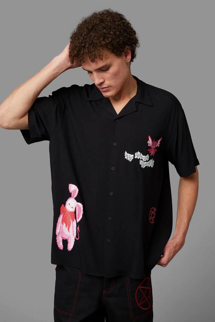 Image of a model wearing Shorts. Productname: Entity Short Sleeve Shirt in Black colour by brand - Black Friday