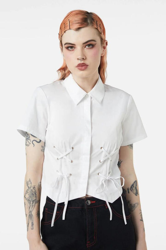 Image of a model wearing Tops. Productname: Eliza Lace Up Blouse in White colour by brand - Dangerfield