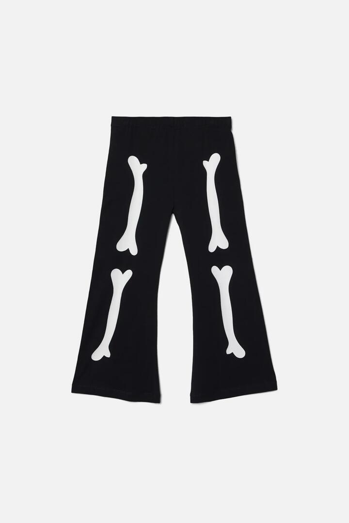 Image of a model wearing Pants. Productname: Bonez Kids Legging in Black colour by brand - Dangerkids