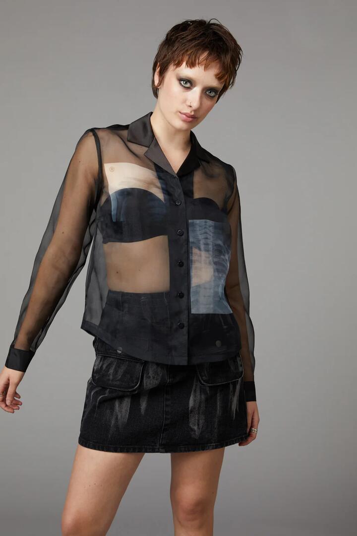 Image of a model wearing Tops. Productname: X-Ray Print Blouse in Black colour by brand - Black Friday