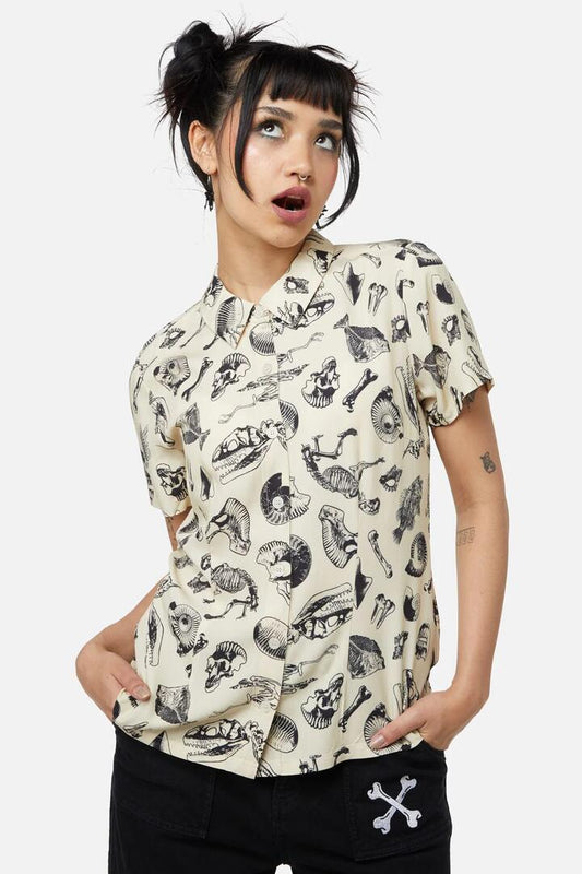 Image of a model wearing Tops. Productname: Body Fossils Printed Blouse in Black colour by brand - Dangerfield