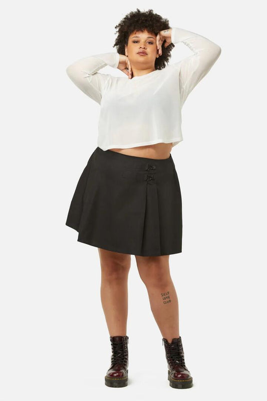 Image of a model wearing Skirts. Productname: Curve Field Work Pleated Skirt in Black colour by brand - Dangerfield