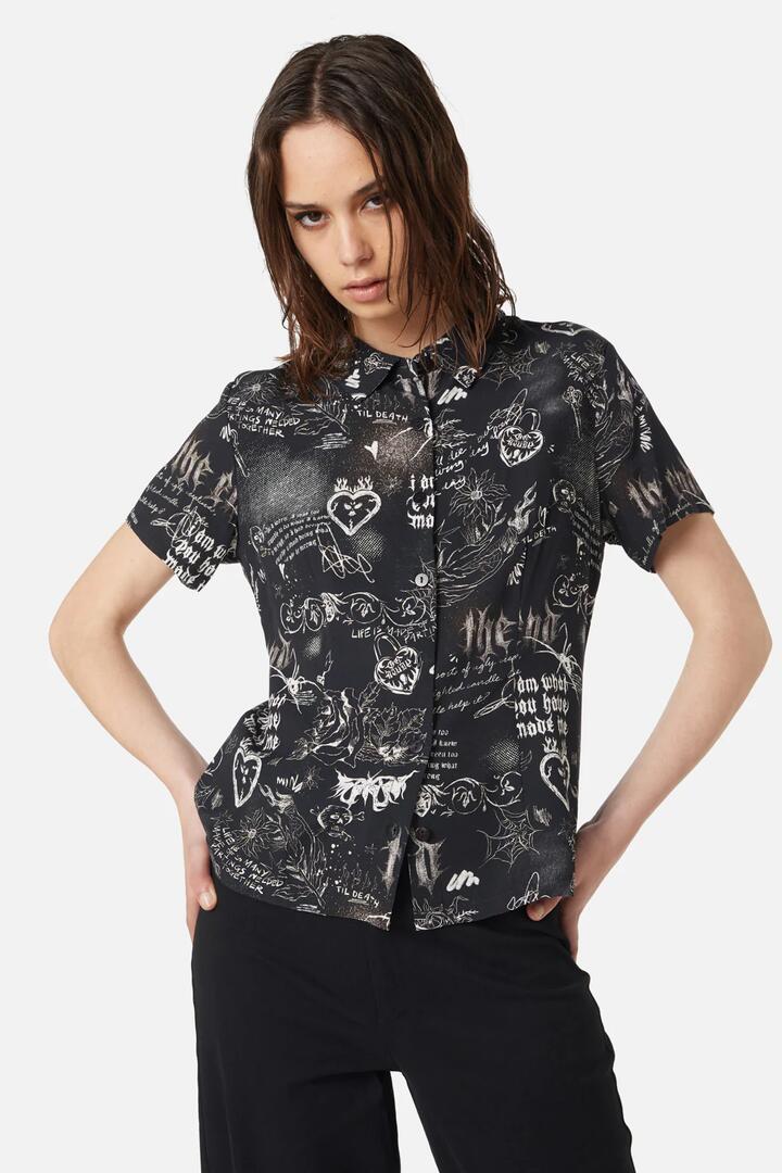 Image of a model wearing Tops. Productname: Lover's Departure Printed Blouse in Beige colour by brand - Dangerfield