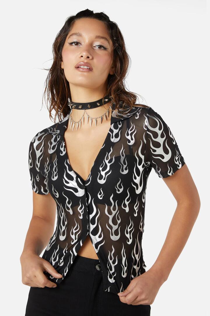 Image of a model wearing Tops. Productname: Naked Flame Mesh Blouse in Black colour by brand - Dangerfield