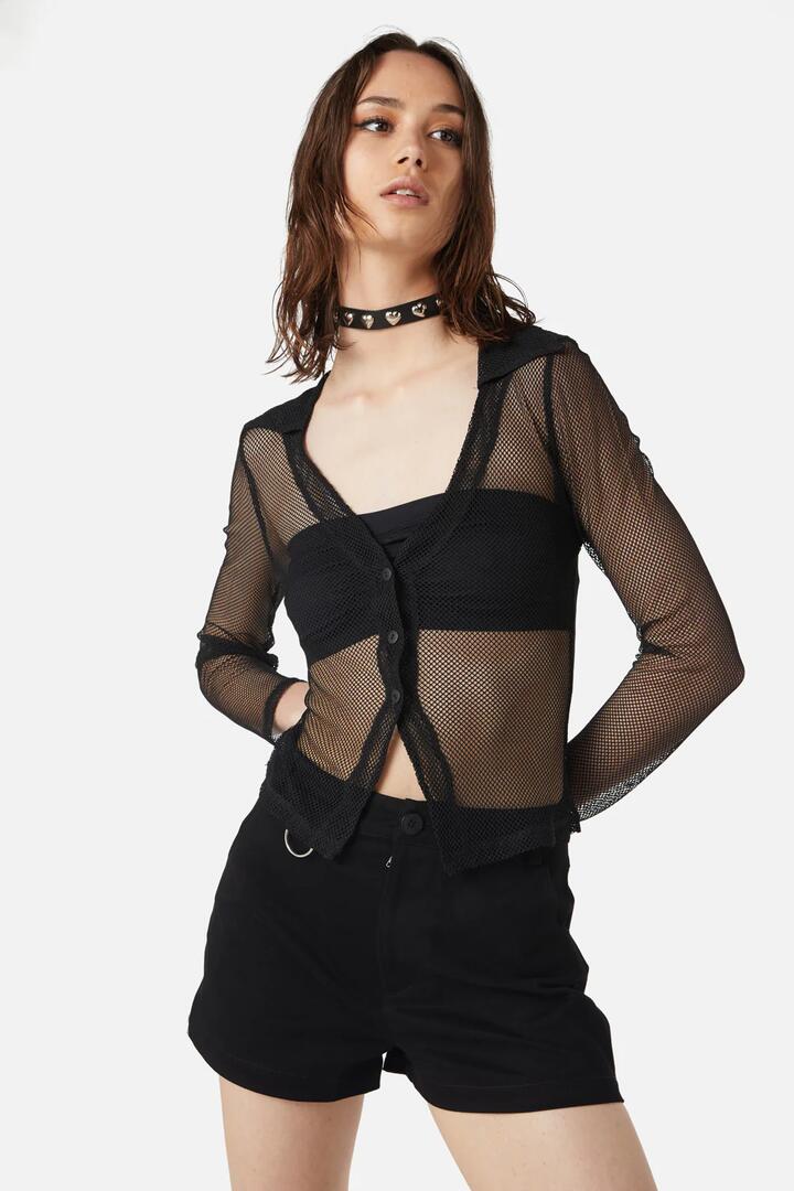 Image of a model wearing Tops. Productname: Industrial Hybrid Mesh Blouse in Black colour by brand - Dangerfield