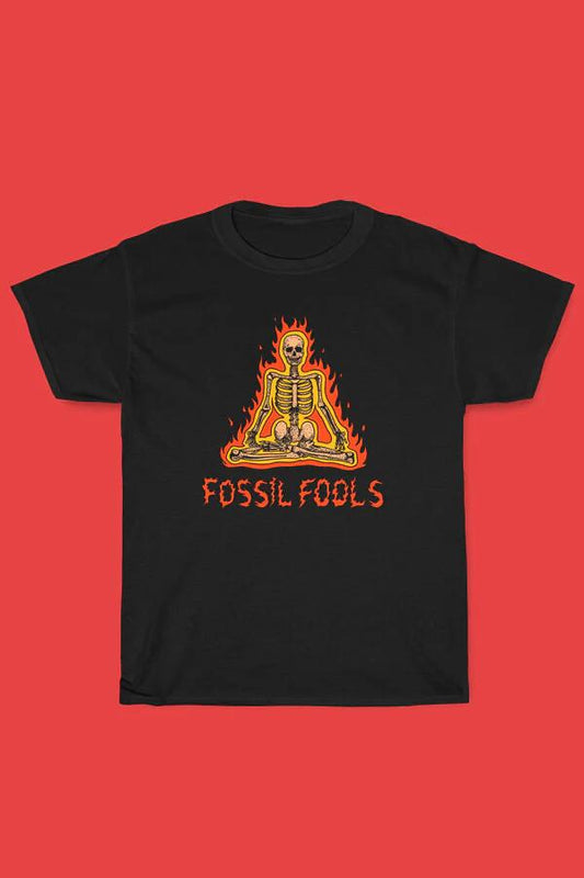 Image of a model wearing Tops. Productname: Fossil Fool Tee in Black colour by brand - Dangerfield