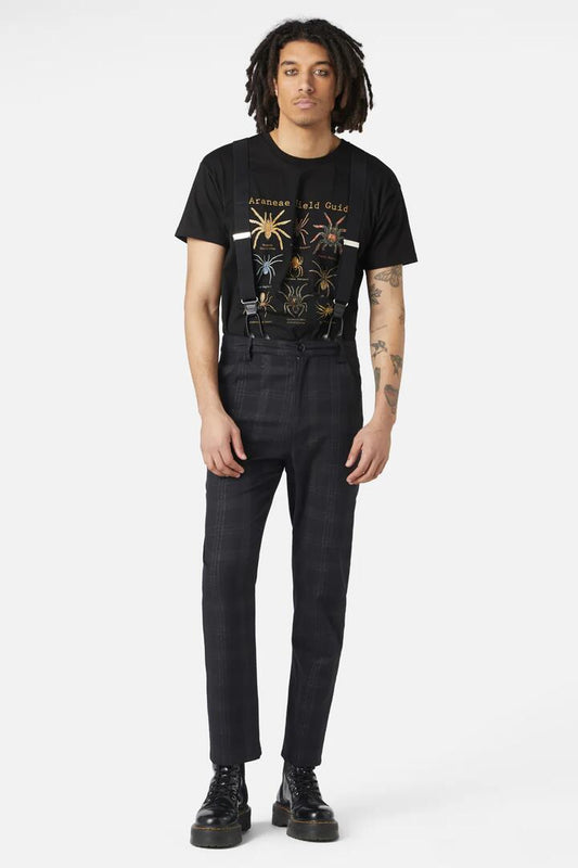 Image of a model wearing Pants. Productname: High Society Tartan Brace Pant in Black colour by brand - Dangerfield