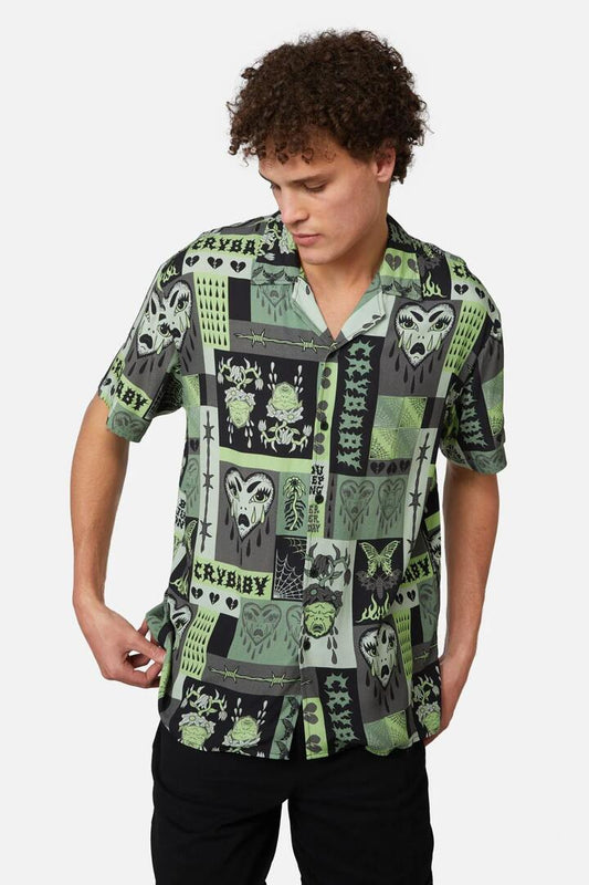 Image of a model wearing Shorts. Productname: Cry Baby Dark Tile Short Sleeve Shirt in Black colour by brand - Dangerfield