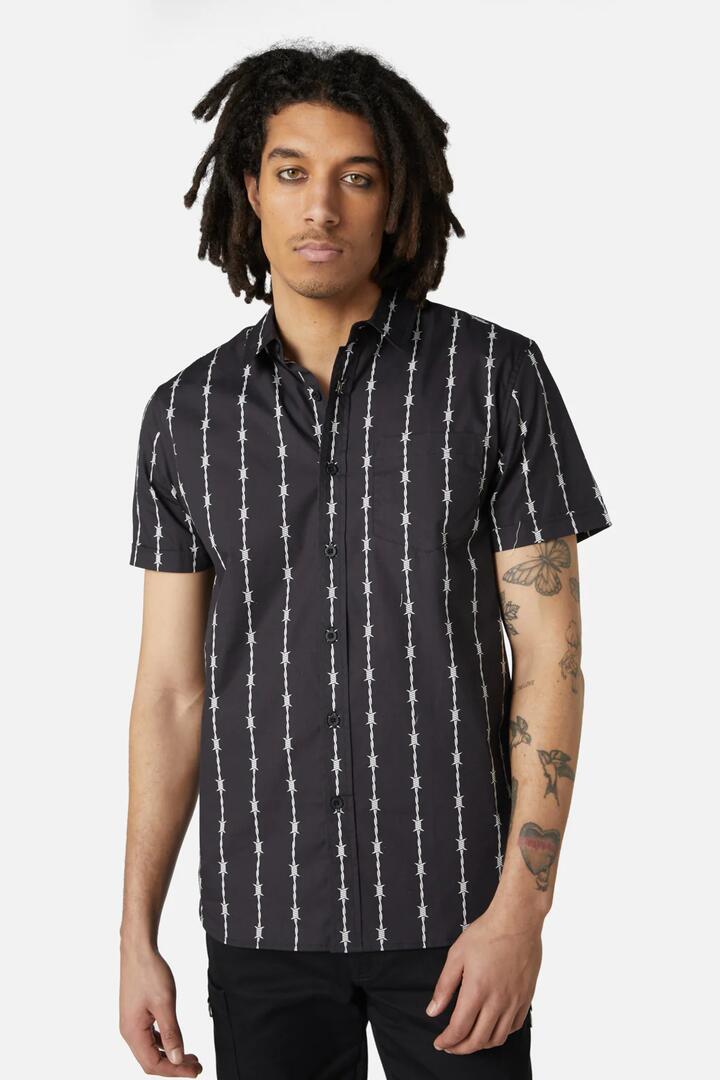 Image of a model wearing Shorts. Productname: Barbed Wire Short Sleeve Shirt in Black/White colour by brand - Dangerfield