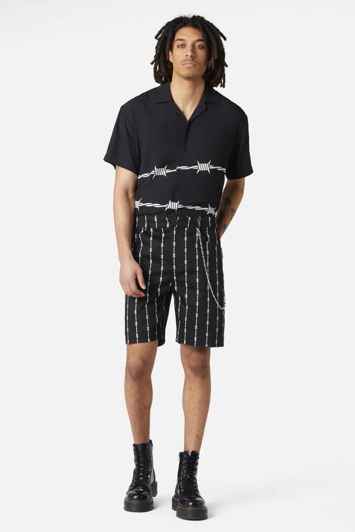 Image of a model wearing Shorts. Productname: Barbed Wire Chain Short in Black/White colour by brand - Dangerfield