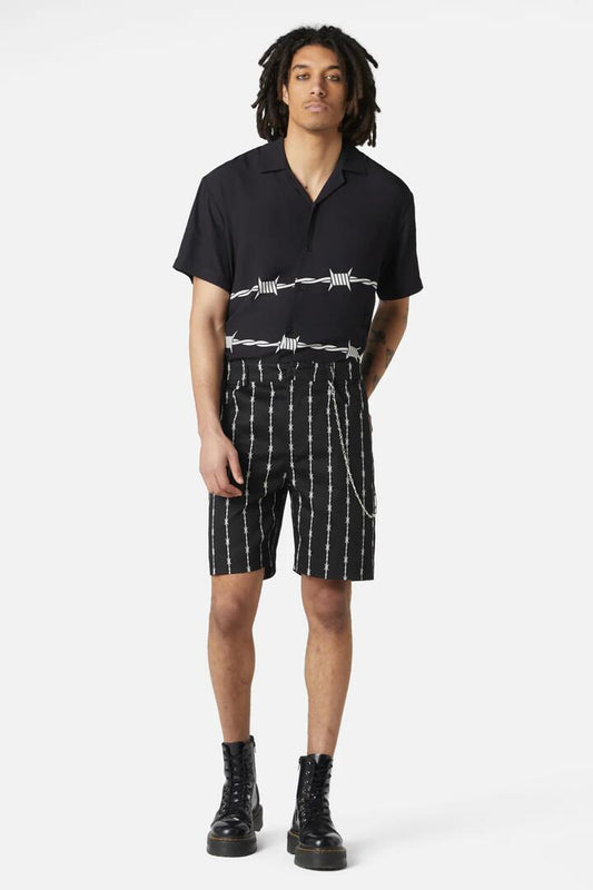 Image of a model wearing Shorts. Productname: Barbed Wire Chain Short in Black/White colour by brand - Dangerfield