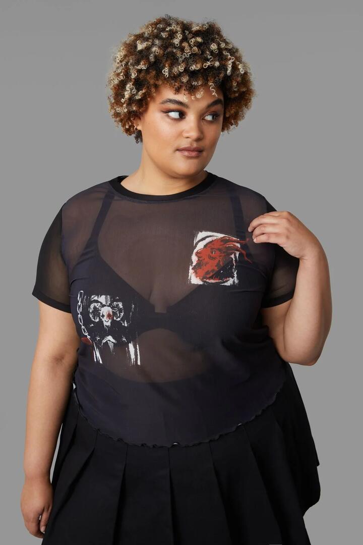 Image of a model wearing Tops. Productname: Curve Goat Top in Black colour by brand - Black Friday