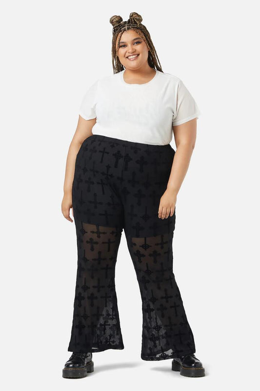 Image of a model wearing Pants. Productname: Curve Vowed Flocked Mesh Pant in Black colour by brand - Dangerfield