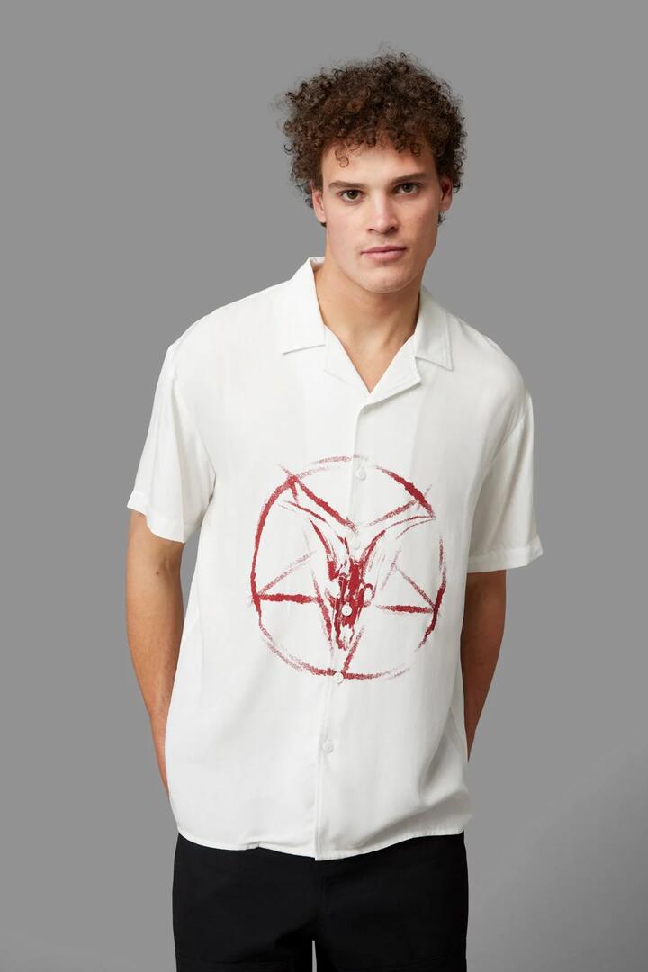 Image of a model wearing Shorts. Productname: Baphomet Short Sleeve Shirt in Cream colour by brand - Black Friday
