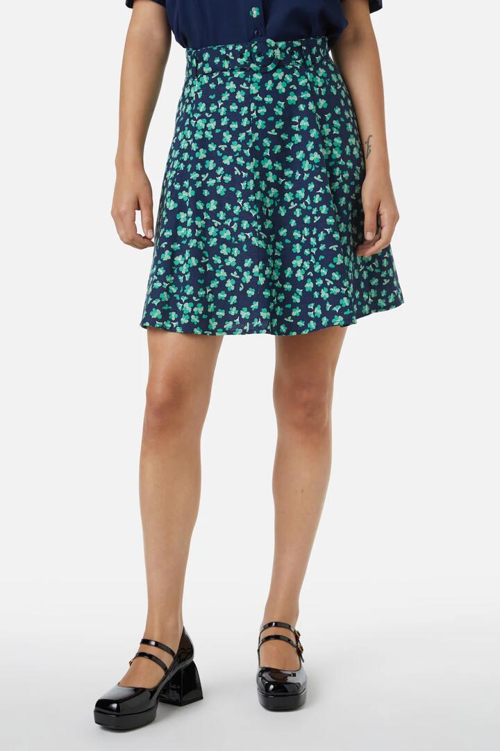 Image of a model wearing Skirts. Productname: Mille Fleur Skirt in Navy colour by brand - Princess Highway