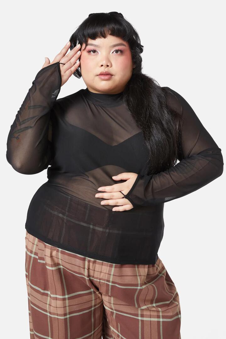 Image of a model wearing Tops. Productname: Curve Comet Top in Black colour by brand - Black Friday