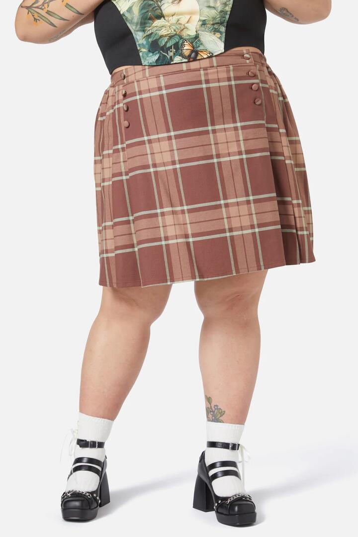 Image of a model wearing Skirts. Productname: Curve Trinkets Skirt in Brown colour by brand - Black Friday