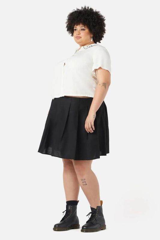 Image of a model wearing Tops. Productname: Curve Splash Blouse in Vintage White colour by brand - Dangerfield