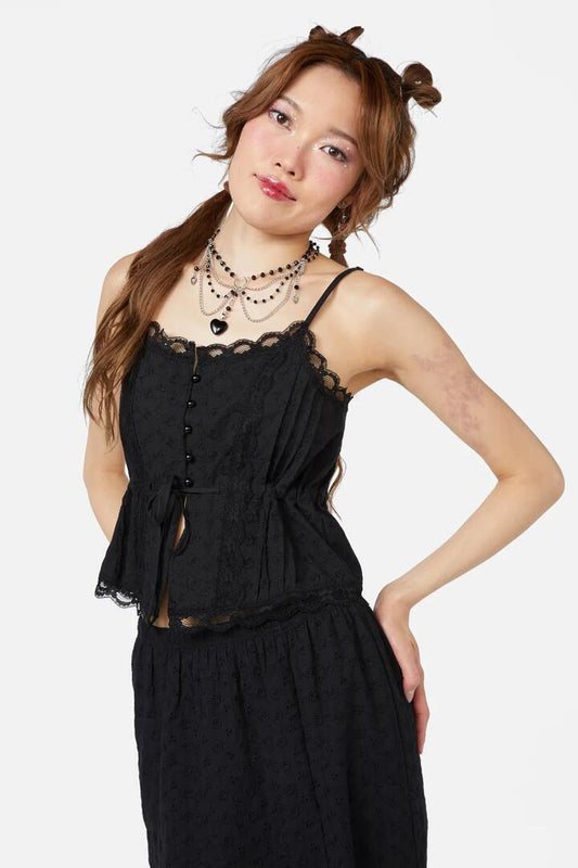 Image of a model wearing Tops. Productname: Sweetie Pie Cami Top in Black colour by brand - Dangerfield