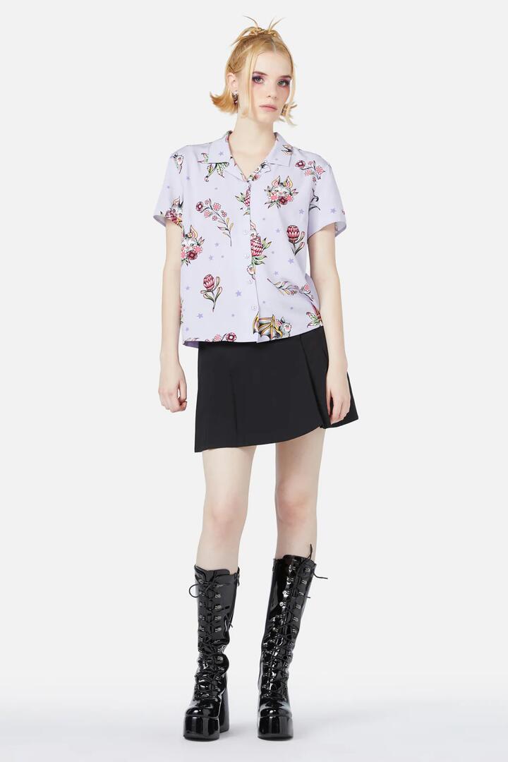Image of a model wearing Tops. Productname: Fruity Bat Blouse in Lilac colour by brand - Black Friday