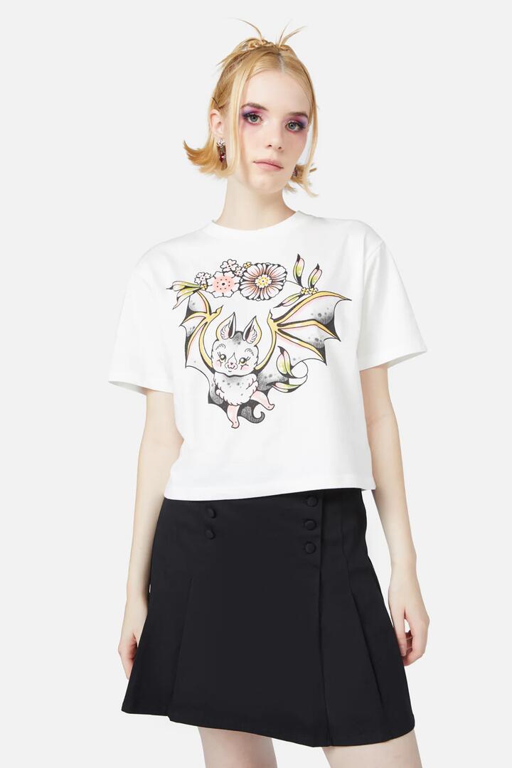 Image of a model wearing Tops. Productname: Fly Away Tee in Vintage White colour by brand - Black Friday