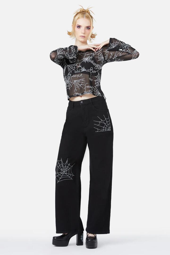 Image of a model wearing Denim. Productname: Elm Embroidery Jeans in Black colour by brand - Black Friday