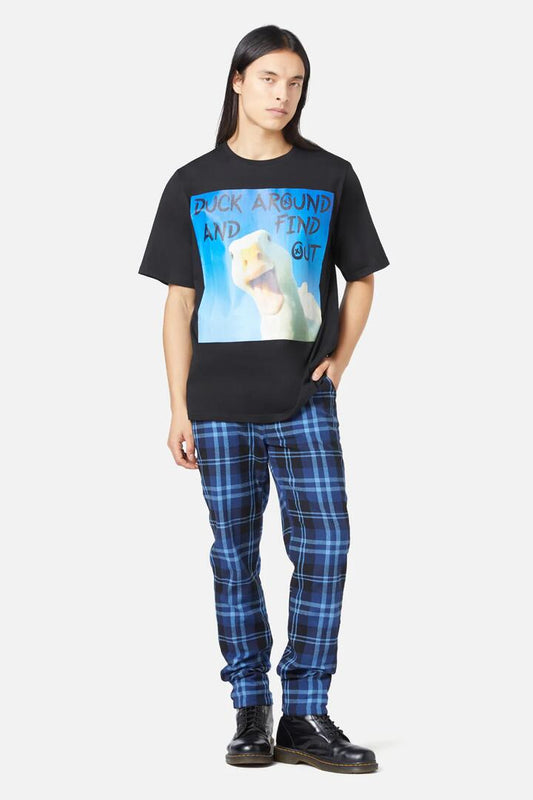 Image of a model wearing Tops. Productname: Duck Around Tee in Black colour by brand - Dangerfield