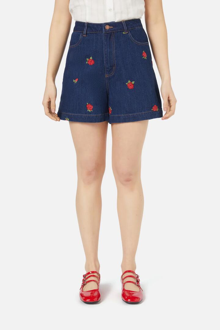 Image of a model wearing Shorts. Productname: Red Roses Short in Dark Denim colour by brand - Princess Highway