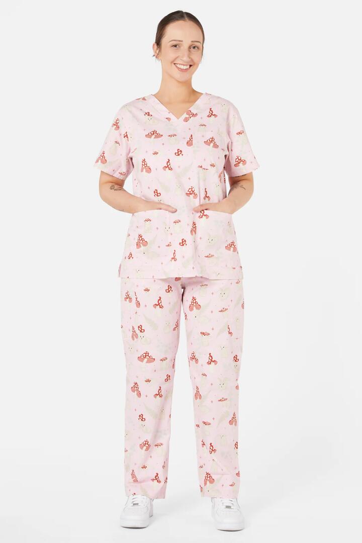 Image of a model wearing Uniforms & Workwear. Productname: Harmony Scrub Set in Pink colour by brand - Dangerfield