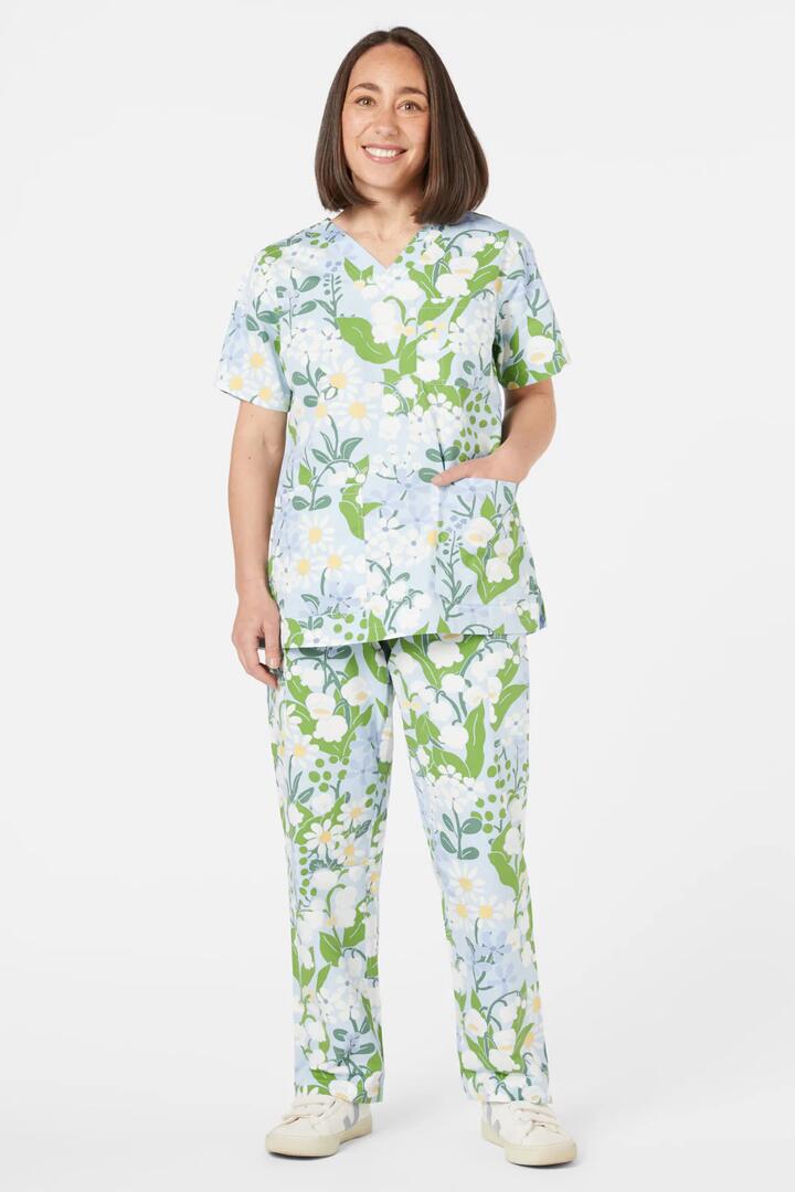 Image of a model wearing Uniforms & Workwear. Productname: Lily Of The Valley Scrub Set in Blue colour by brand - Dangerfield