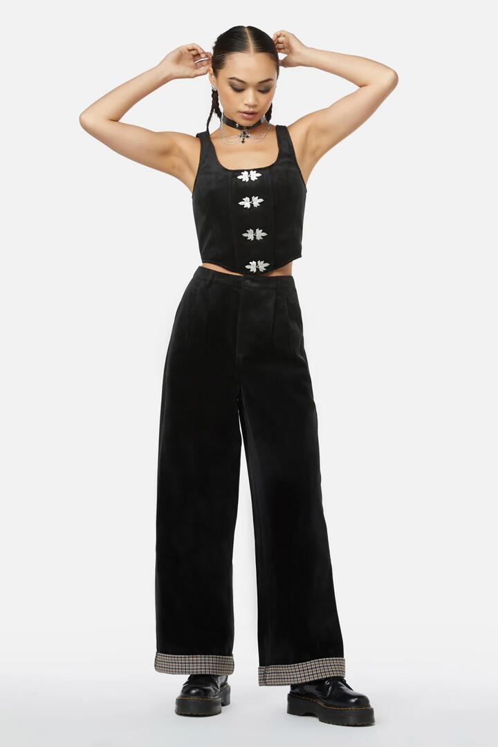 Image of a model wearing Pants. Productname: Snail Mail Pant in Black colour by brand - Black Friday