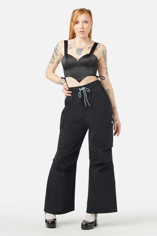 Image of a model wearing Pants. Productname: Slumber Cargo Pant in Black colour by brand - Dangerfield