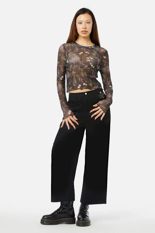 Image of a model wearing Tops. Productname: Old World Mesh Top in Black colour by brand - Dangerfield