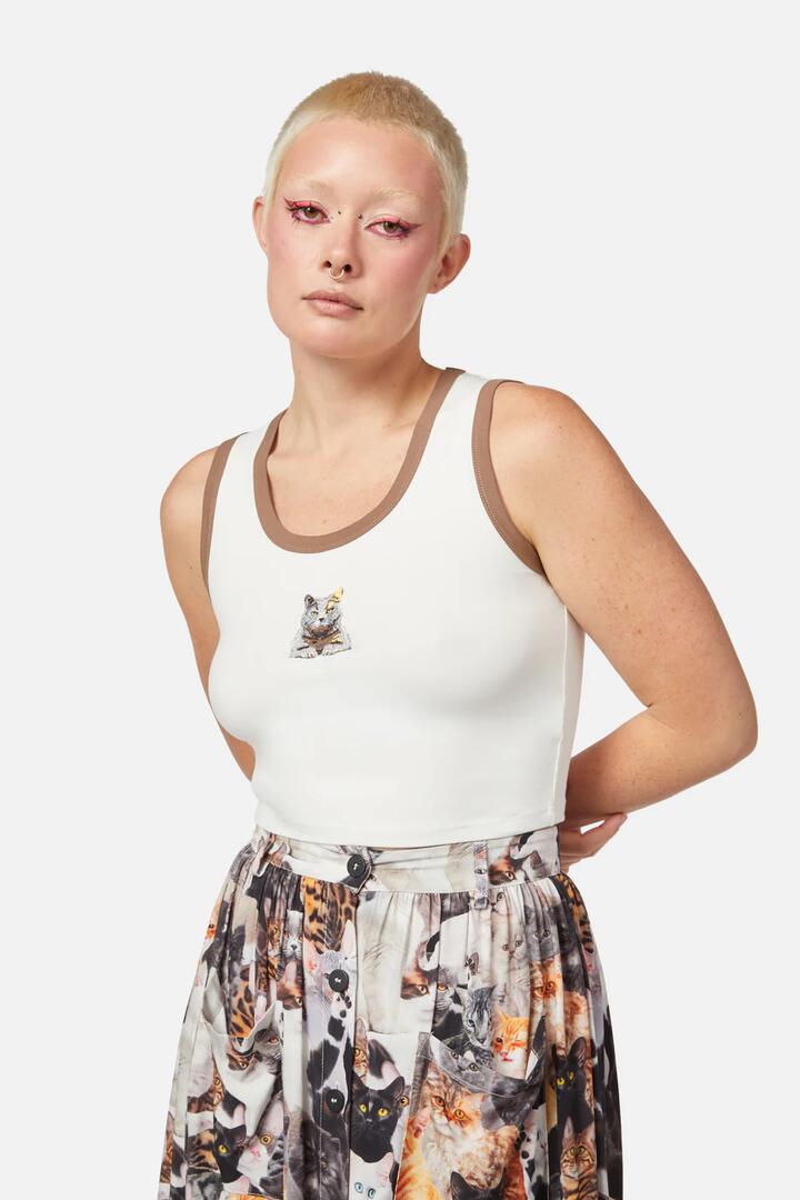 Image of a model wearing Tops. Productname: Catnip Cross Stitch Tank in Cream colour by brand - Dangerfield