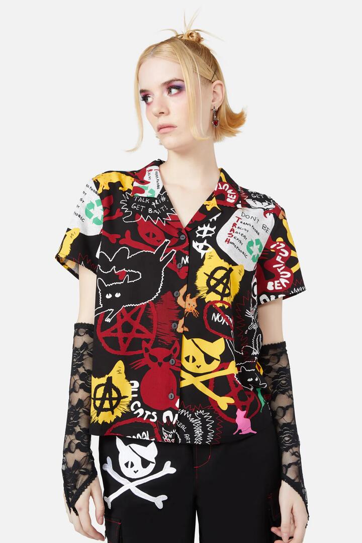 Image of a model wearing Tops. Productname: Kitty Riot Blouse in Black colour by brand - Black Friday