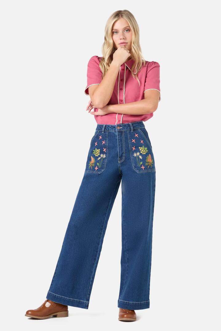 Image of a model wearing Denim. Productname: Native Embroidered Denim Jean in Blue Denim colour by brand - Princess Highway