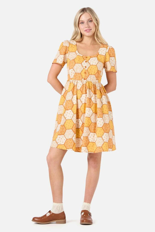 Image of a model wearing Dress. Productname: Patchwork Sleeved Mini Dress in Gold colour by brand - Princess Highway