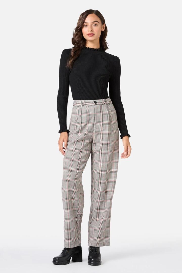 Image of a model wearing Pants. Productname: Joe Check Tailored Pant in Black/Red colour by brand - Princess Highway
