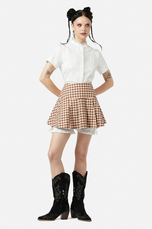 Image of a model wearing Skirts. Productname: Saloon Gingham Skort in Cream/Brown colour by brand - Black Friday