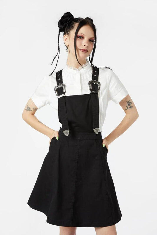 Image of a model wearing Dress. Productname: Boothill Pinny in Black colour by brand - Black Friday