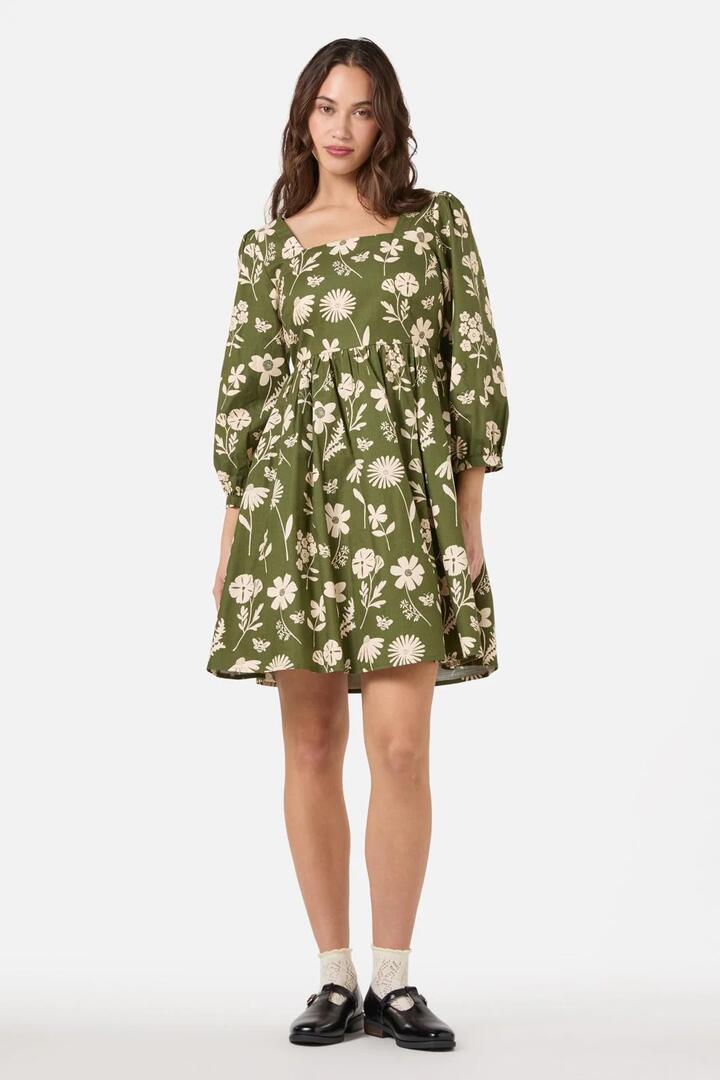 Image of a model wearing Dress. Productname: Variety Fleur 3/4 Sleeve Dress in Olive colour by brand - Princess Highway