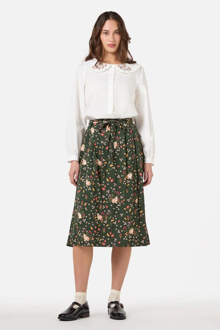 Image of a model wearing Skirts. Productname: Coco Rabbit Midi Skirt in Olive colour by brand - Princess Highway