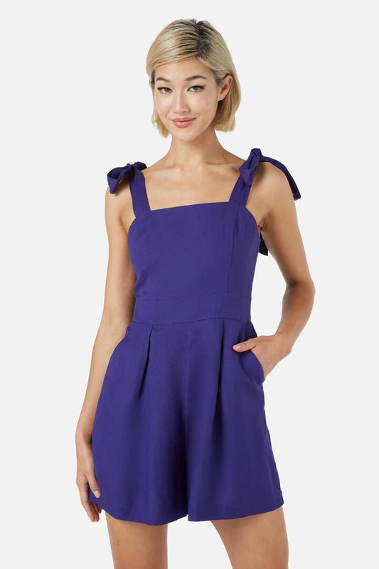 Image of a model wearing Dress. Productname: Portia Playsuit in Violet colour by brand - Princess Highway