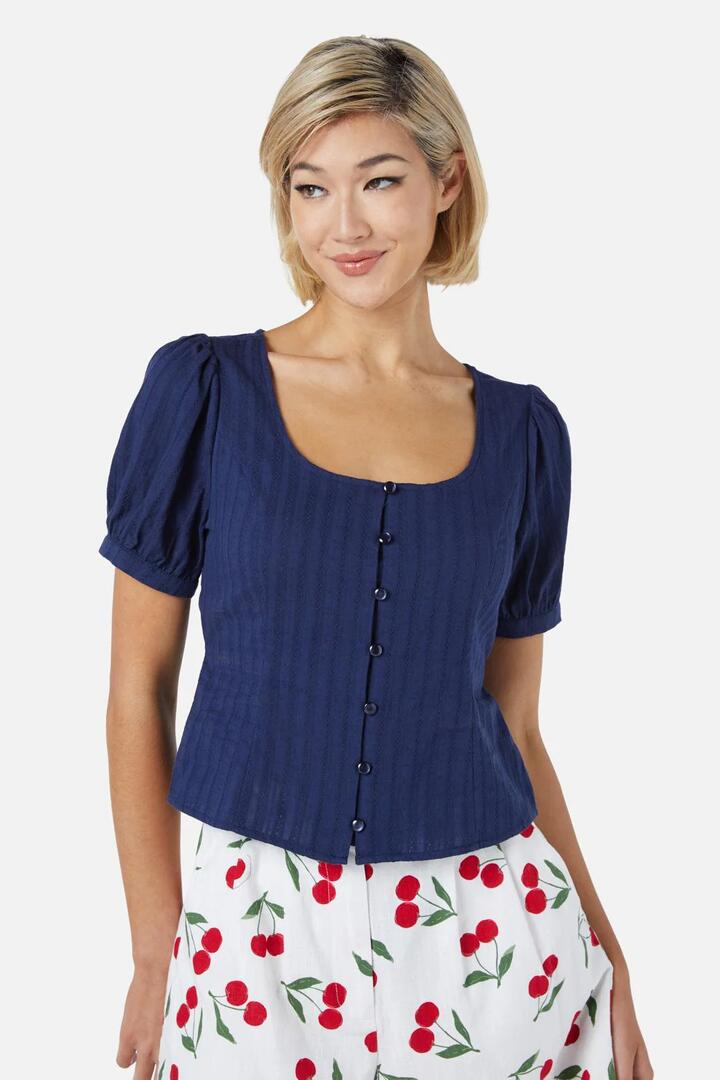 Image of a model wearing Tops. Productname: Neisha Top in Navy colour by brand - Princess Highway