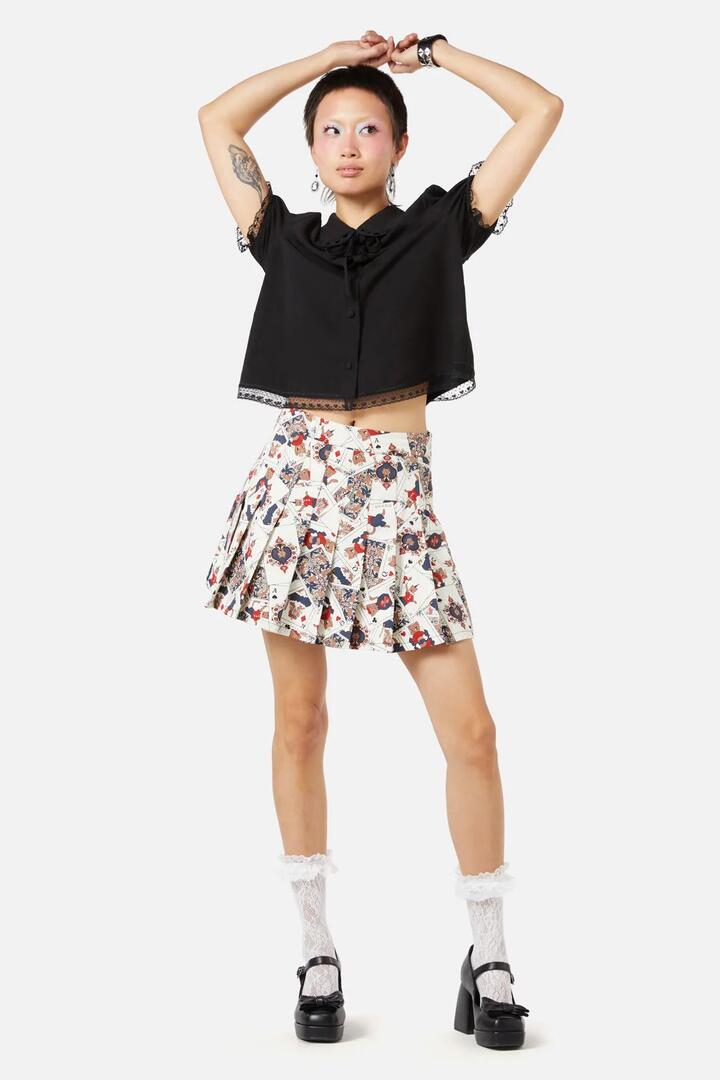 Image of a model wearing Skirts. Productname: Queen Of Cats Print Skort in Cream colour by brand - Dangerfield