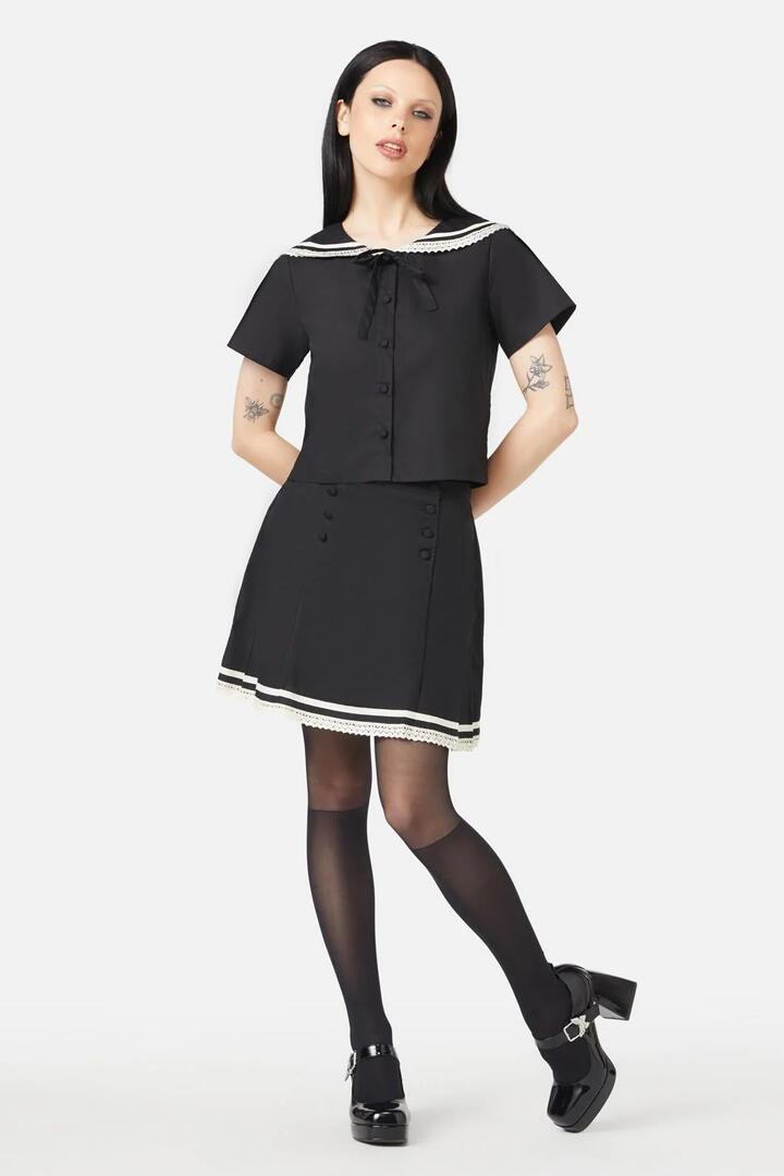 Image of a model wearing Skirts. Productname: Rebirth Sailor Skirt in Black colour by brand - Black Friday
