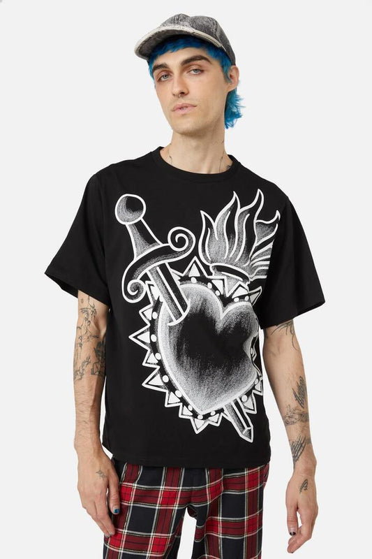 Image of a model wearing Tops. Productname: Mercy Heart Placement Tee in Black colour by brand - Dangerfield