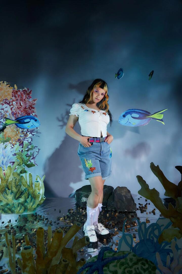 Image of a model wearing Tops. Productname: Fish Are Friends Top in Cream colour by brand - Dangerfield