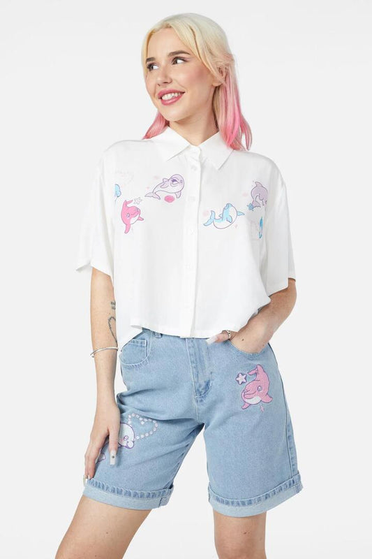 Image of a model wearing Tops. Productname: Fin-Tastic Blouse in Cream colour by brand - Dangerfield